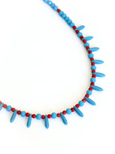 Load image into Gallery viewer, Necklace with blue and red beads on a white background